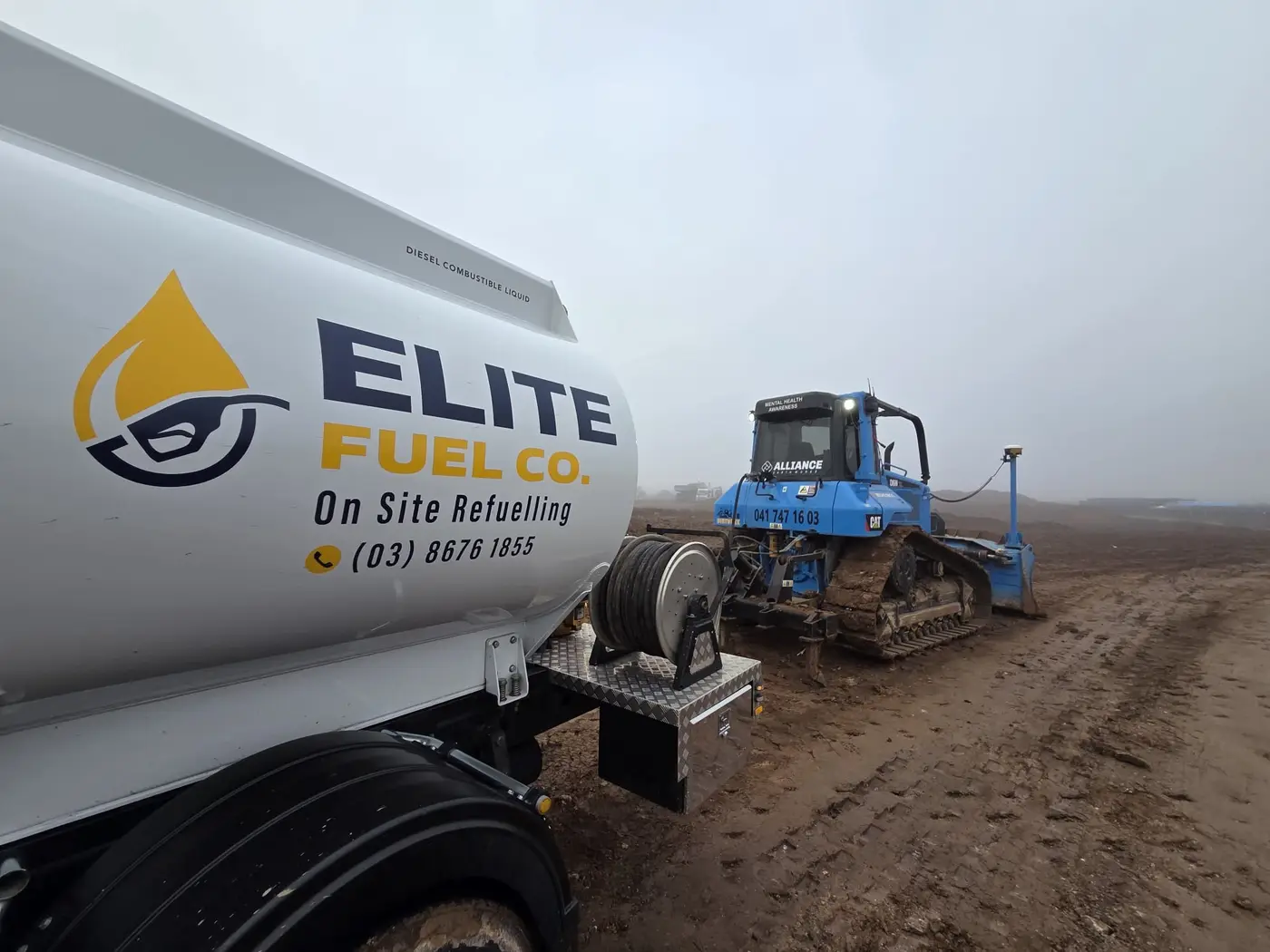 Elite Fuel Co. tanker on-site refuelling a dozer on a Melbourne earthworks site